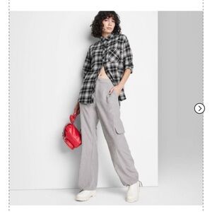 Women's Long Sleeve Hi-Low Oversized Flannel Shirt - Wild Fable™ Black Plaid 1X